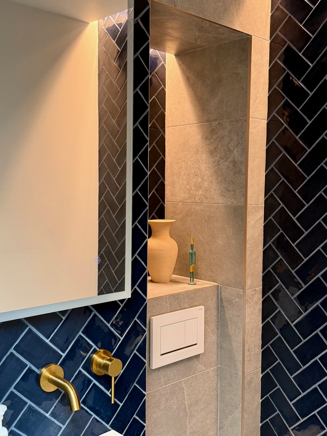 Powder room brass tap detail